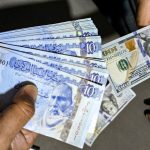 AFP 20250417 42M886D v1 HighRes LibyaEconomyForexCurrencyDinarDevaluation
