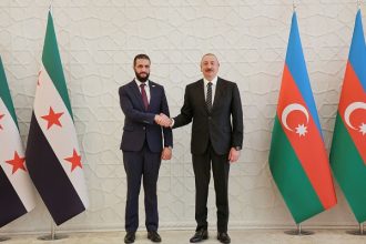 AFP 20250712 66LP4T6 v2 HighRes AzerbaijanSyriaSummitPoliticsDiplomacy