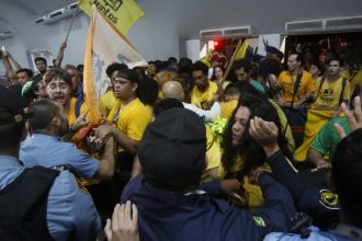 Protesters storm the COP30 conference venue and clash with security