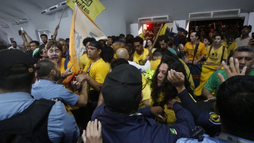 Protesters storm the COP30 conference venue and clash with security