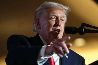 AFP 20251210 87M62GE v1 HighRes UsPoliticsEconomyTrump