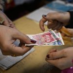 AFP 20251223 88UM4T3 v1 HighRes InBulgariaVillagersFretAboutEuroIntroduction